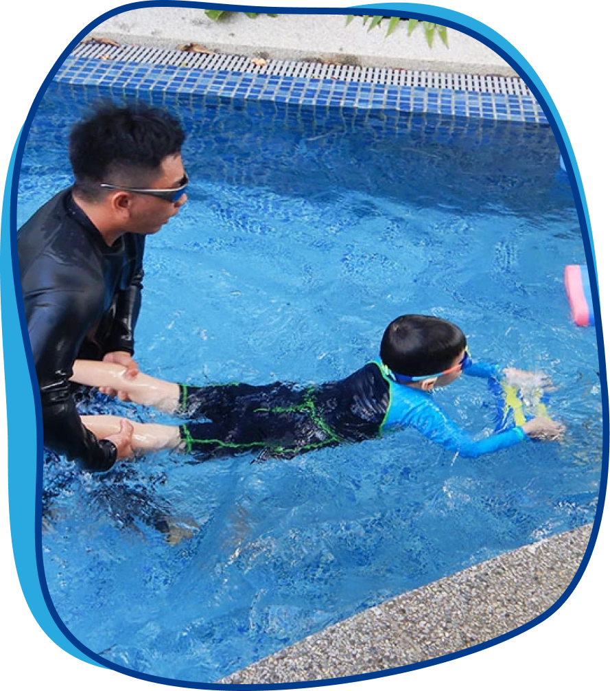 Swimming lesson coach guiding young student with kickboard